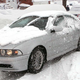 Illustration for article titled Neighbors Come Together To Watch BMW Owner Struggle In Snow